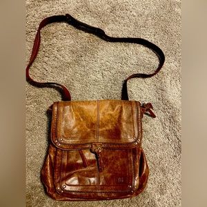 The SAK Brown leather convertible shoulder to backpack bag